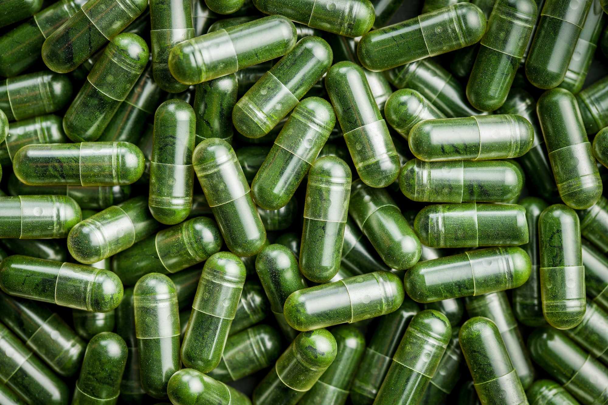 Green chlorella pills or green barley pills.